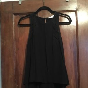 Black sleeveless tank top with tie sides